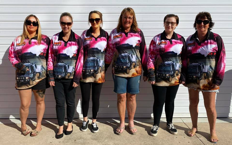 Jawa Off Road Camper Trailers Long sleeve pink fishing shirts worn by six different women of varying ages and sizes front view. Available in Sunshine Coast Queensland.
