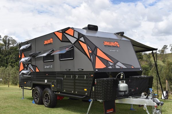 Jawa Tarwarri hard top caravan parked in reserve. Large family camper trailer accommodating 5 people perfect for off road. Available in Sunshine Coast Queensland.
